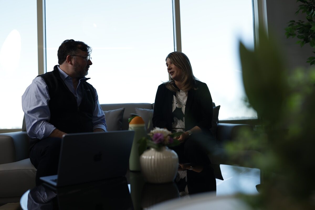 Two colleagues in lounge